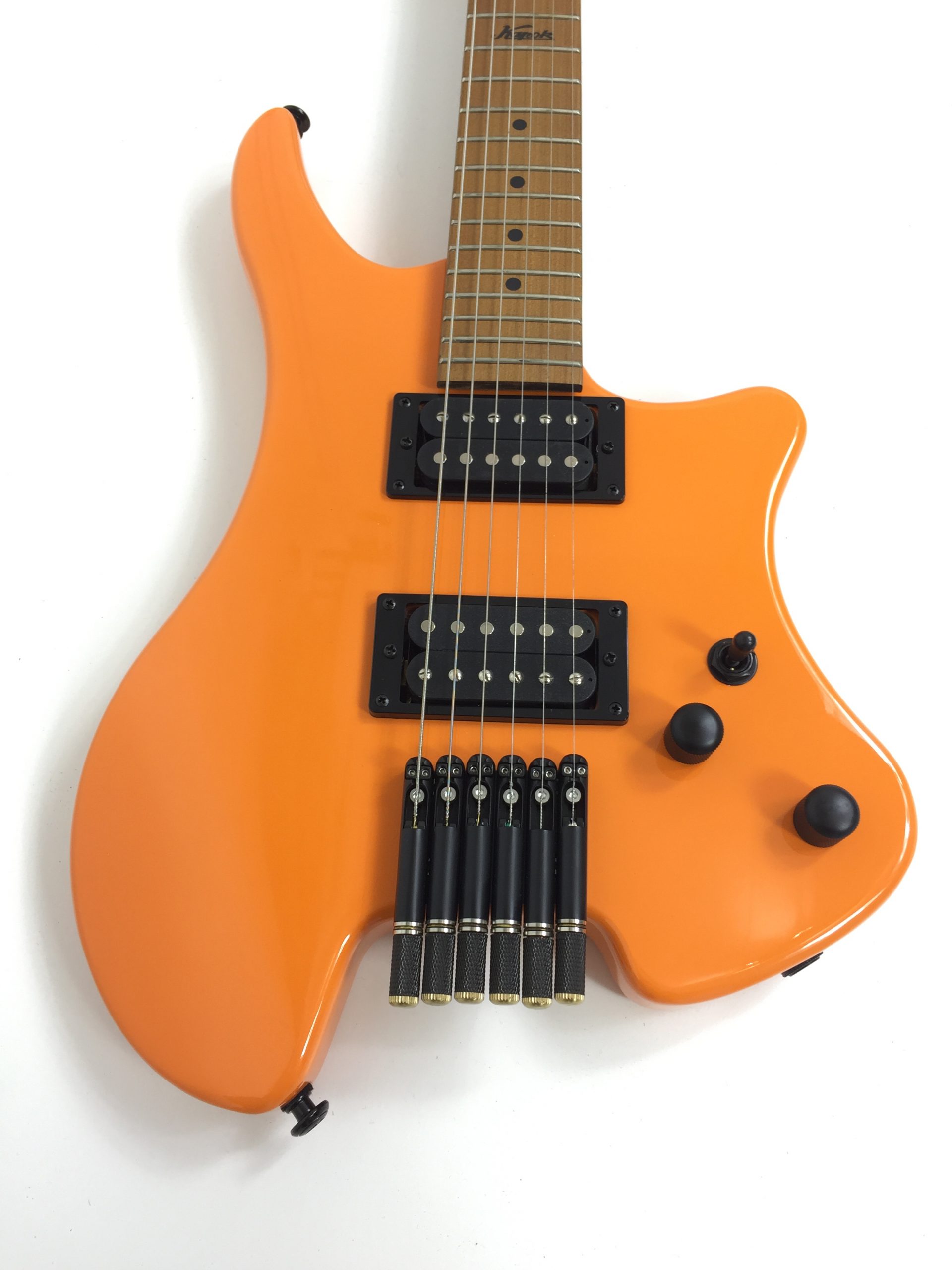 orange and black guitar